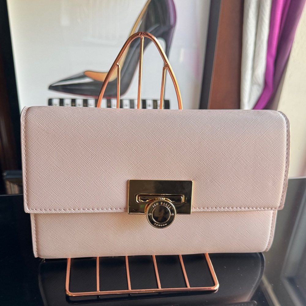 Sophisticated Ted Baker Blush Crossbody/ Clutch with Gold Accents.